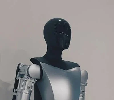 Tesla Optimus humanoid robot in a standing position.